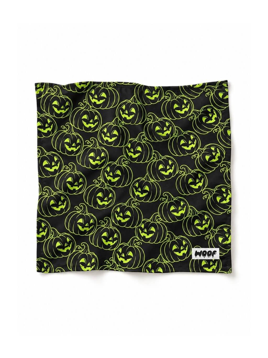 Green Pumpkin dog bandana in black with a neon green jack-o-lantern pattern, laid out flat
