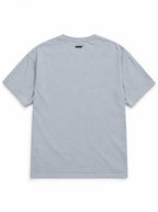 Back of the Labrador Halloween oversized T-shirt in Light Washed Denim with small WOOF logo below the collar