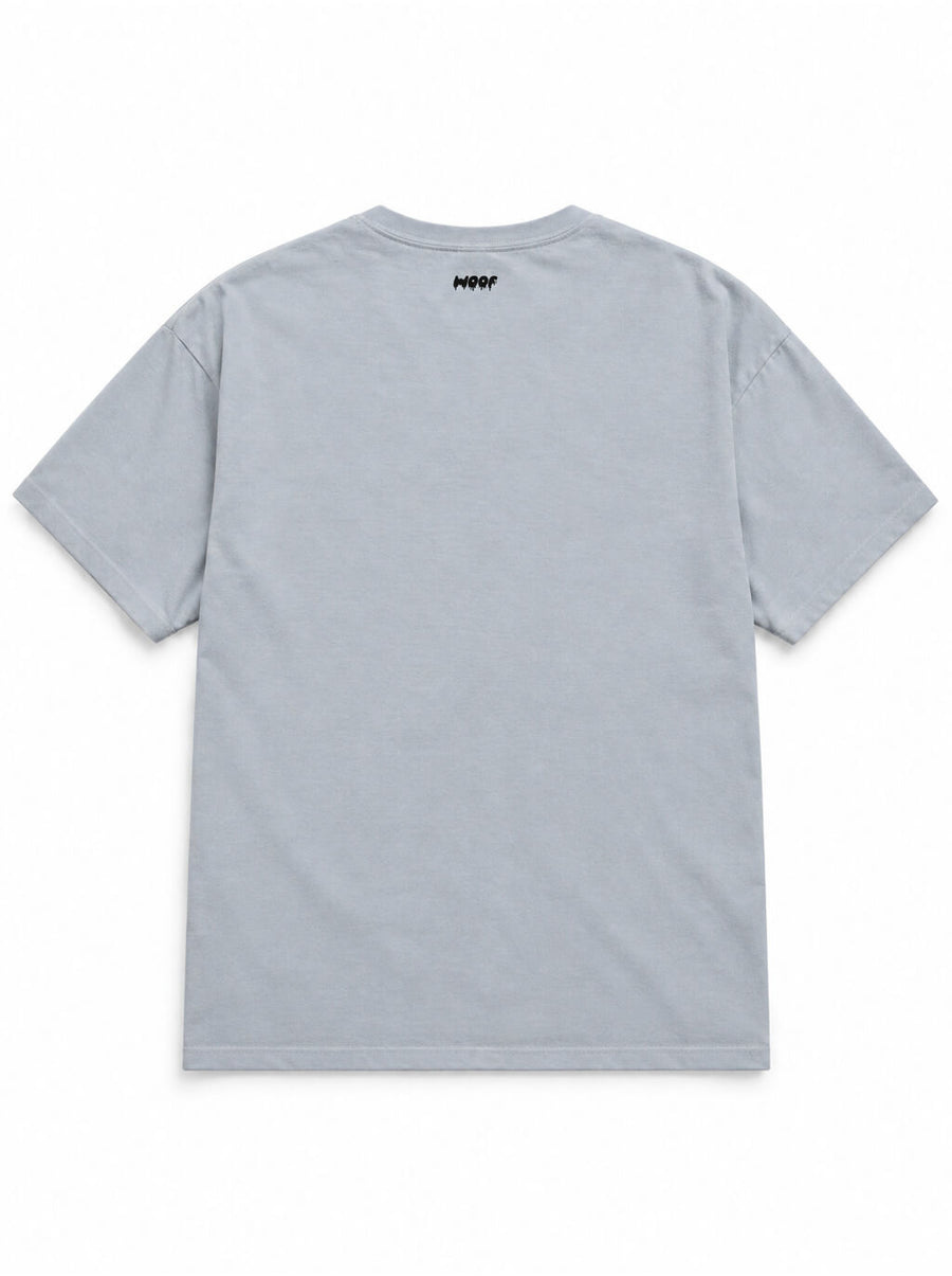 Back of the Labrador Halloween oversized T-shirt in Light Washed Denim with small WOOF logo below the collar