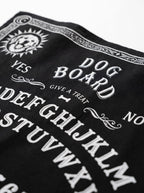 Close-up of the "Dog Board – Give a Treat" print on the black Ouija Board dog bandana