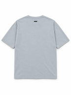 Back of the Paranormal Loaf Corgi oversized Halloween T-shirt in Light Washed Denim with small WOOF logo below the collar