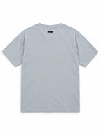 Back of the Pumpkin Patch Corgi oversized Halloween T-shirt in Light Washed Denim with small WOOF logo below the collar