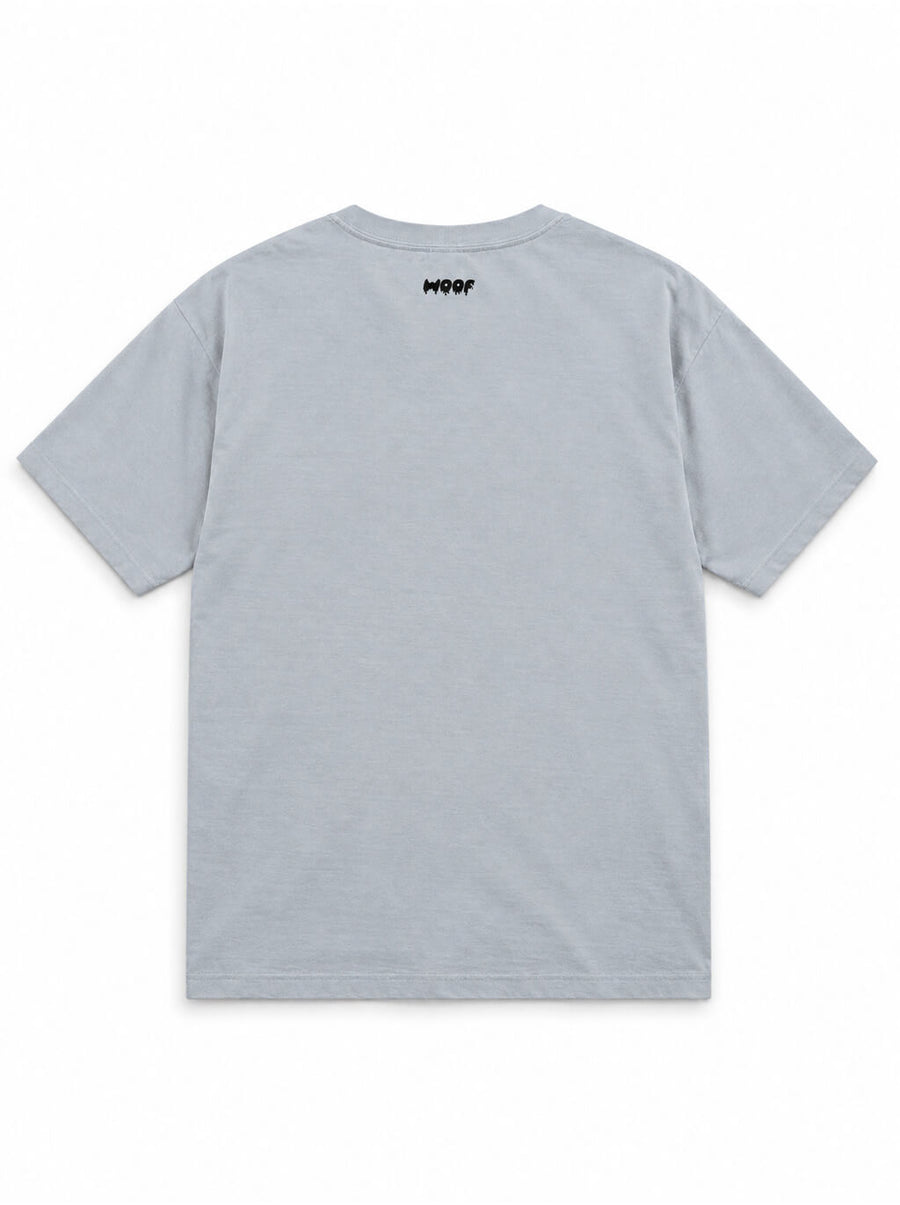 Back of the Pumpkin Patch Corgi oversized Halloween T-shirt in Light Washed Denim with small WOOF logo below the collar