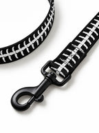 Close-up of the Skeleton leash with white bone print and matte black snap hook