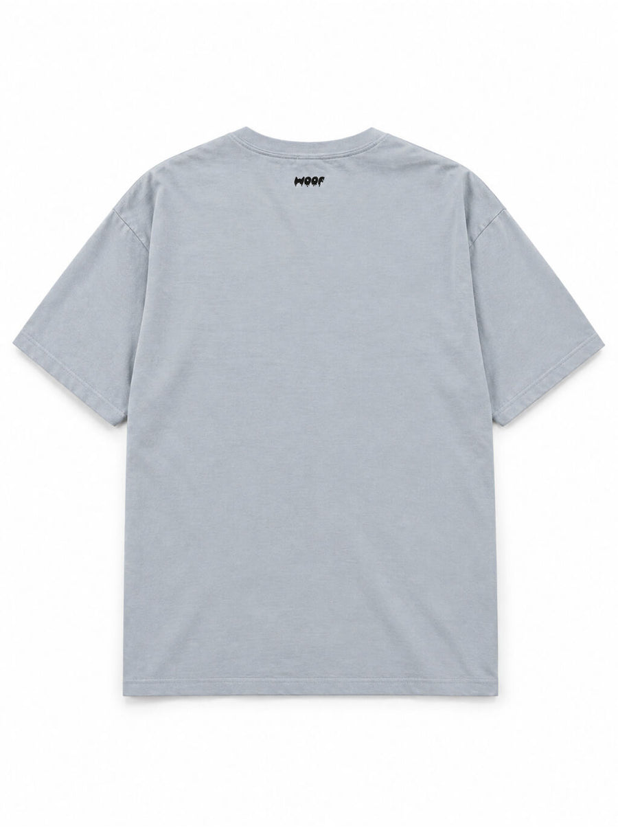 Back of the Trick or Treat Great Dane oversized Halloween T-shirt in Light Washed Denim with small WOOF logo below the collar