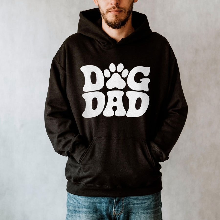 Dog Dad Hoodie from WOOF, unisex fleece hoodie with paw print lettering across the chest